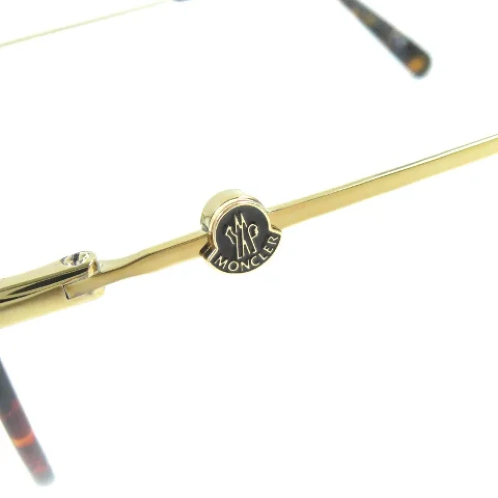 Moncler Pre-owned Metal sunglasses Brown Dames
