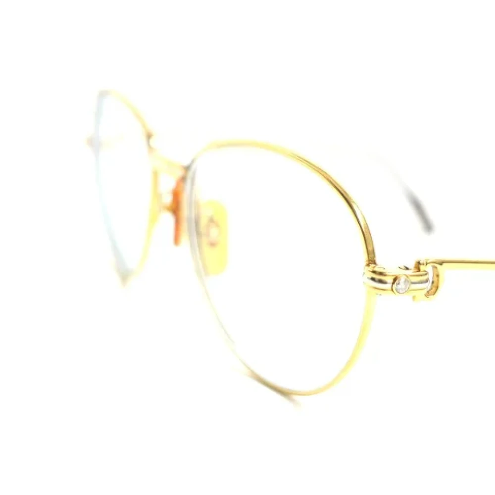 Cartier Vintage Pre-owned Metal sunglasses Yellow Dames