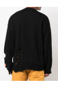 pull-en-maille-dechiquetee-a-logo