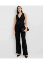 black-buttoned-vest-deep-v-neck