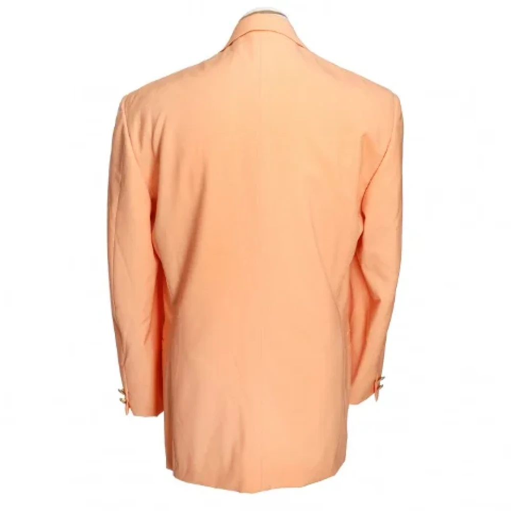 Versace Pre-owned Wool outerwear Orange Dames