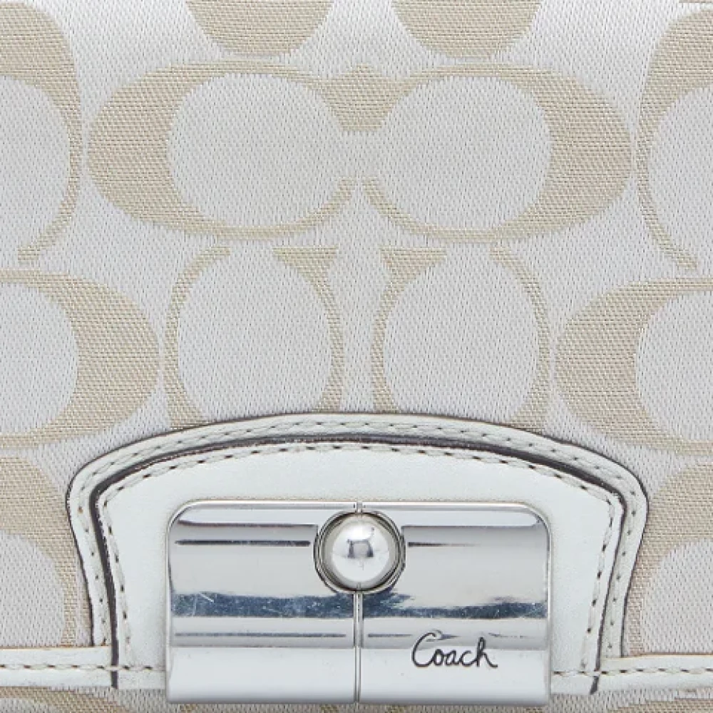 Coach Pre-owned Canvas wallets Beige Dames