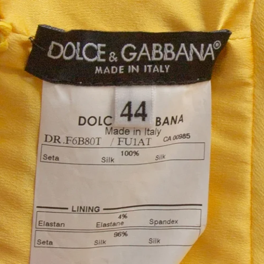 Dolce & Gabbana Pre-owned Silk dresses Yellow Dames
