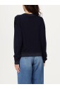 pull-en-tricot-bleu-avec-bordure-pailletee