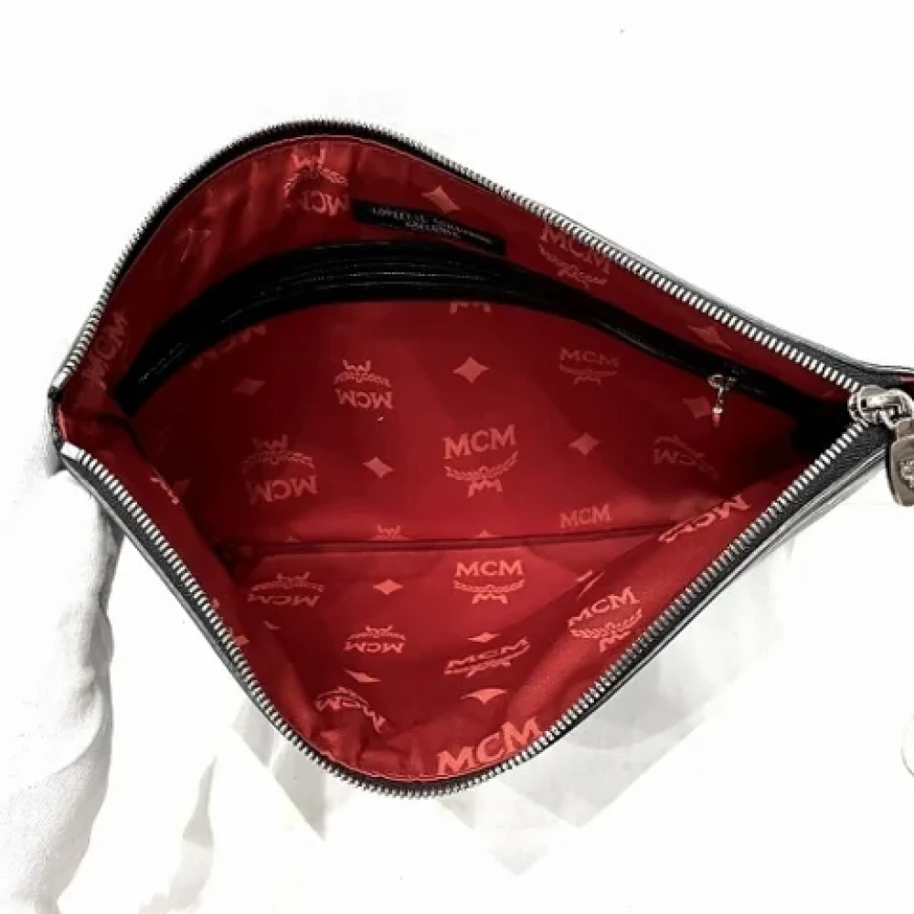 MCM Pre-owned Leather clutches Black Dames
