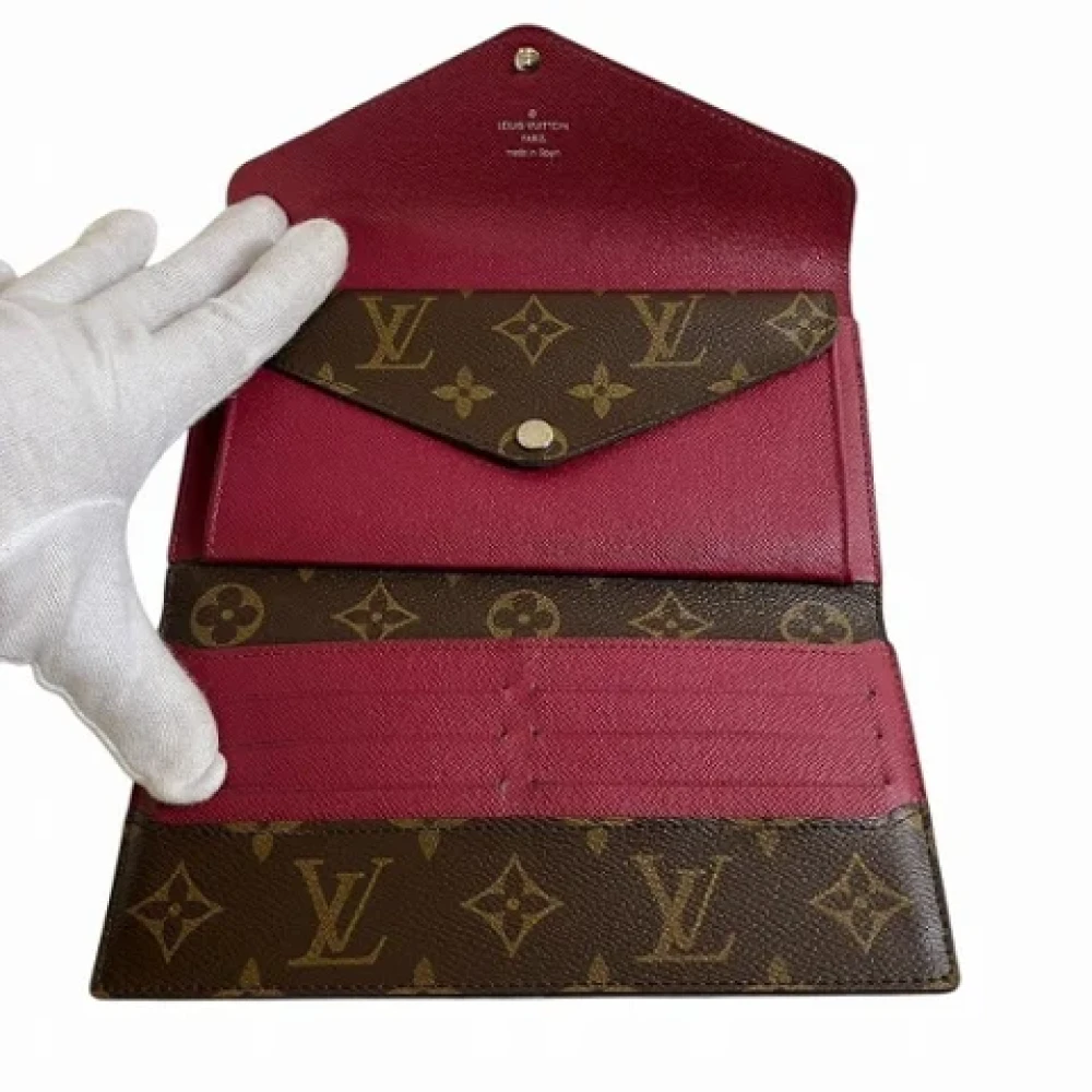 Louis Vuitton Vintage Pre-owned Leather wallets Brown Dames
