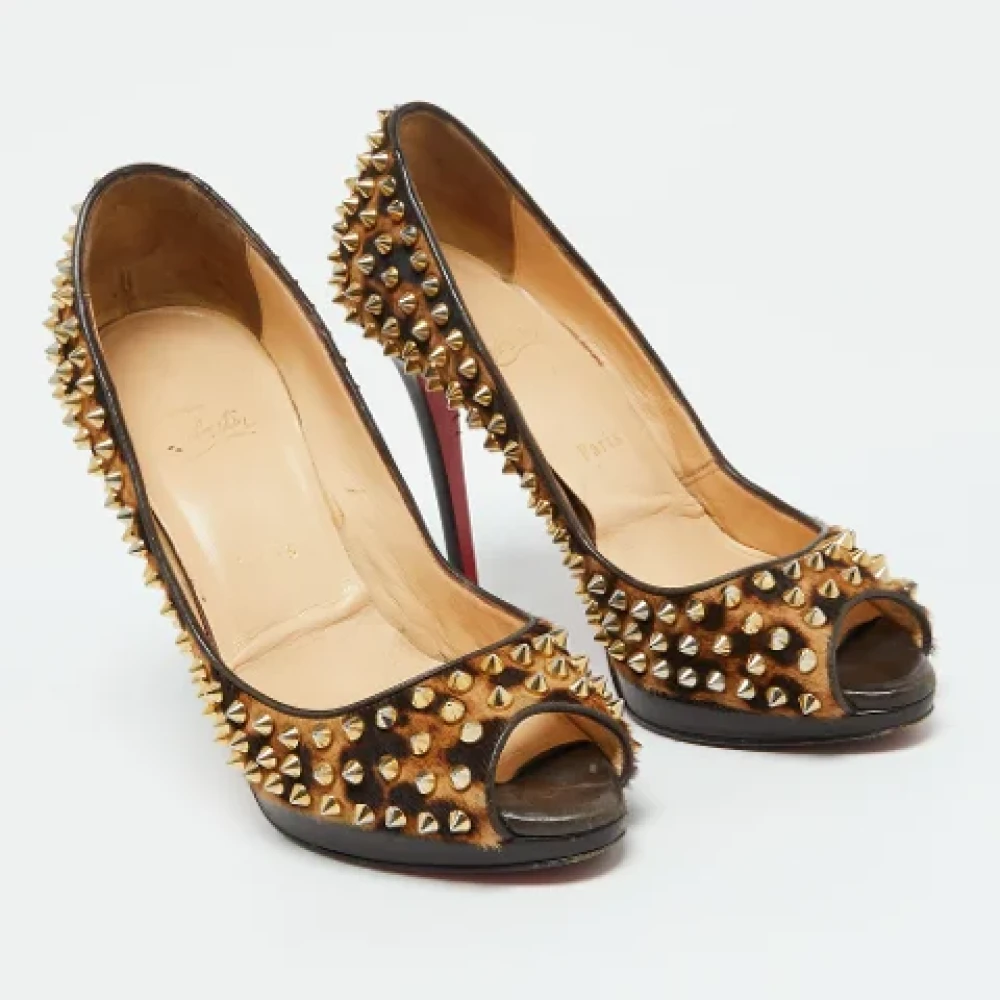 Christian Louboutin Pre-owned Fabric heels Brown Dames