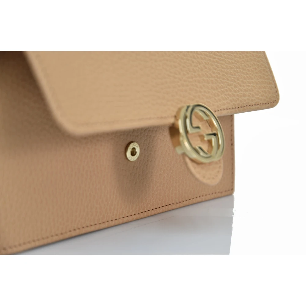 Gucci Interlocking Pebbled Leather Crossbody Tas Beige Dames