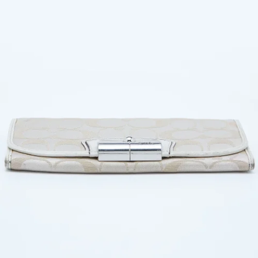 Coach Pre-owned Canvas wallets Beige Dames