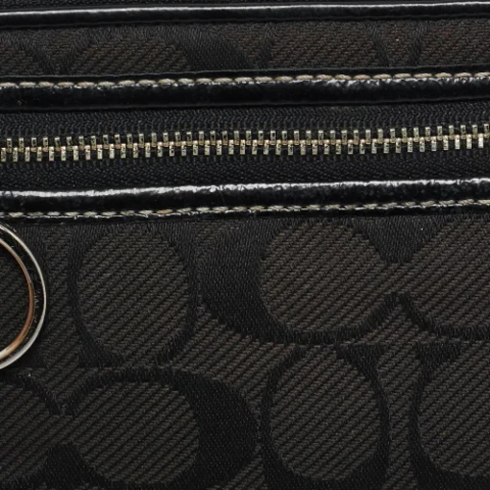 Coach Pre-owned Canvas clutches Black Dames
