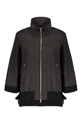 waterproof-cape-coat-with-knit-inserts