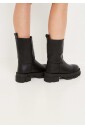 chunky-sole-bottines-en-cuir-noir