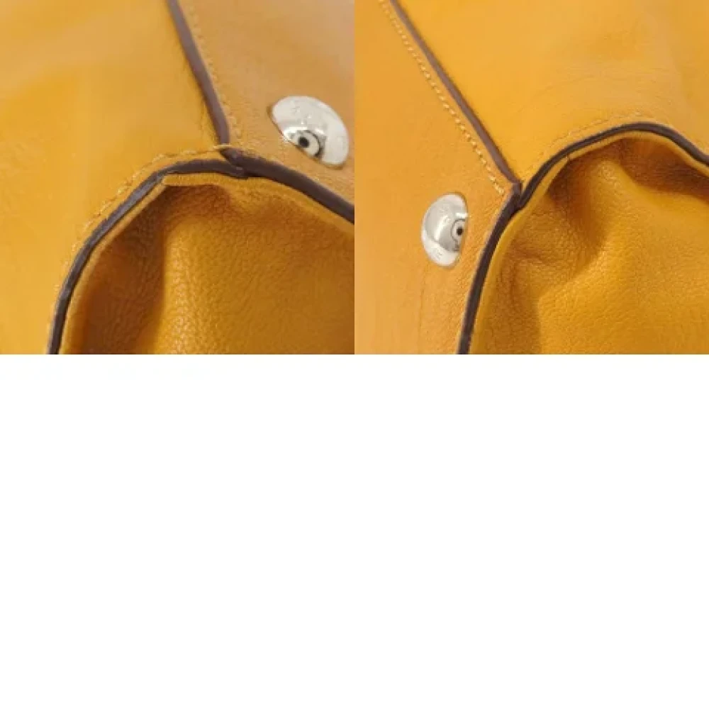 Michael Kors Pre-owned Fabric handbags Yellow Dames