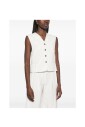 gilet-blanc-col-v-a-poches