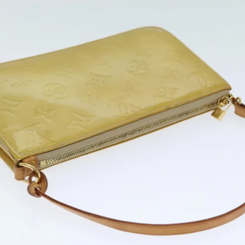 Louis Vuitton Vintage Pre-owned Leather pouches Beige Dames