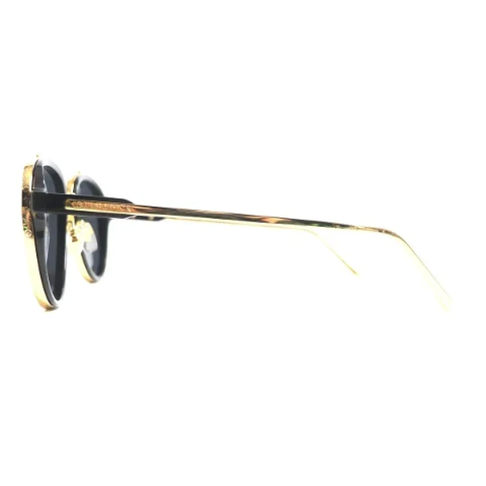 Louis Vuitton Vintage Pre-owned Metal sunglasses Yellow Dames
