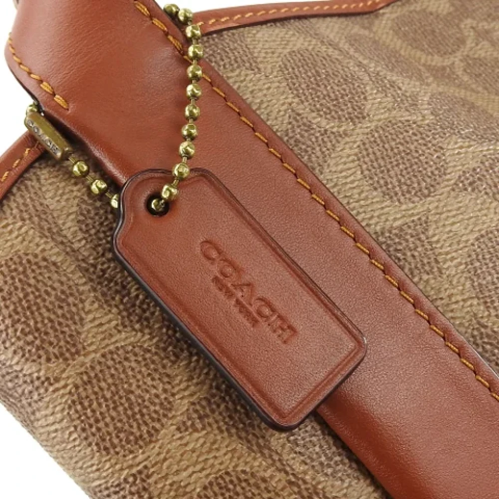Coach Pre-owned Plastic handbags Brown Dames