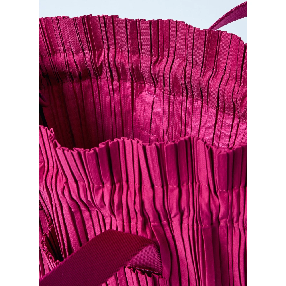Issey Miyake Geplooide Handtas Pink Dames