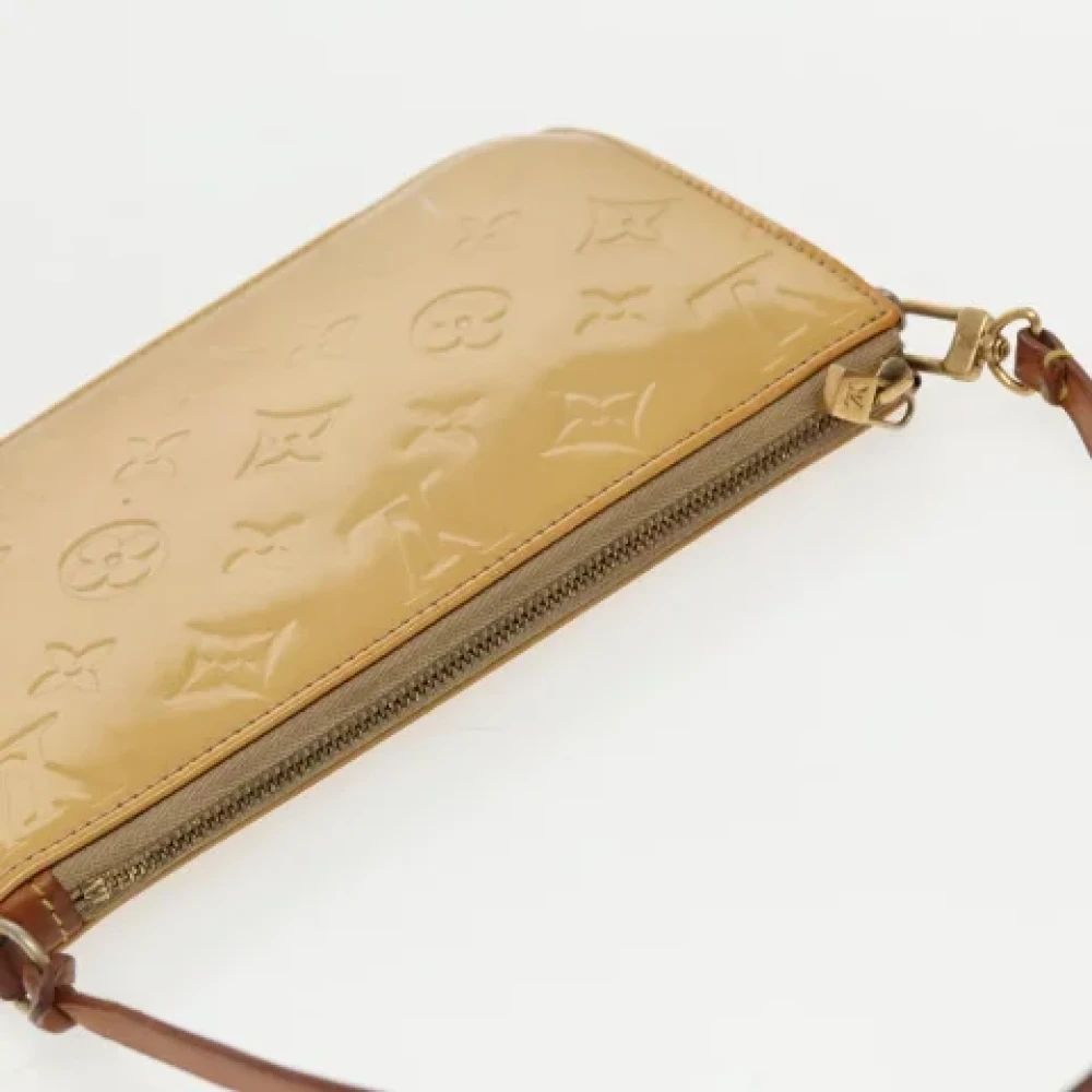 Louis Vuitton Vintage Pre-owned Leather pouches Beige Dames