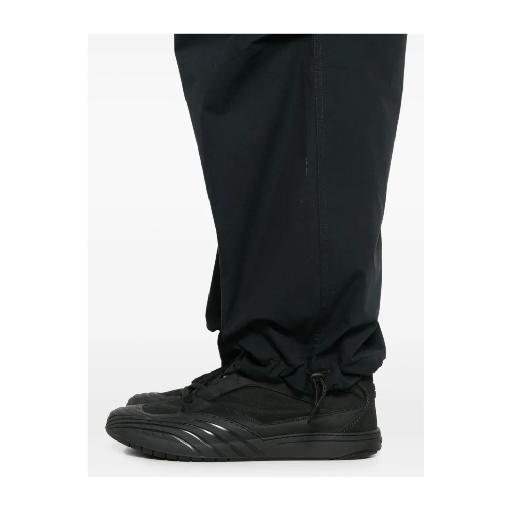 Studio Nicholson Zwarte katoenen taps toelopende broek met trekkoord Black Heren