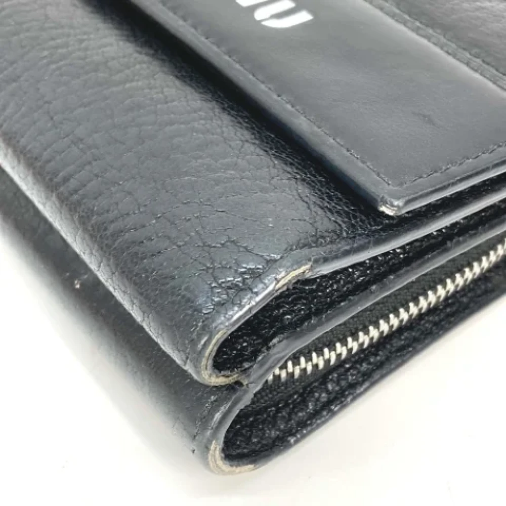 Miu Pre-owned Leather wallets Black Dames