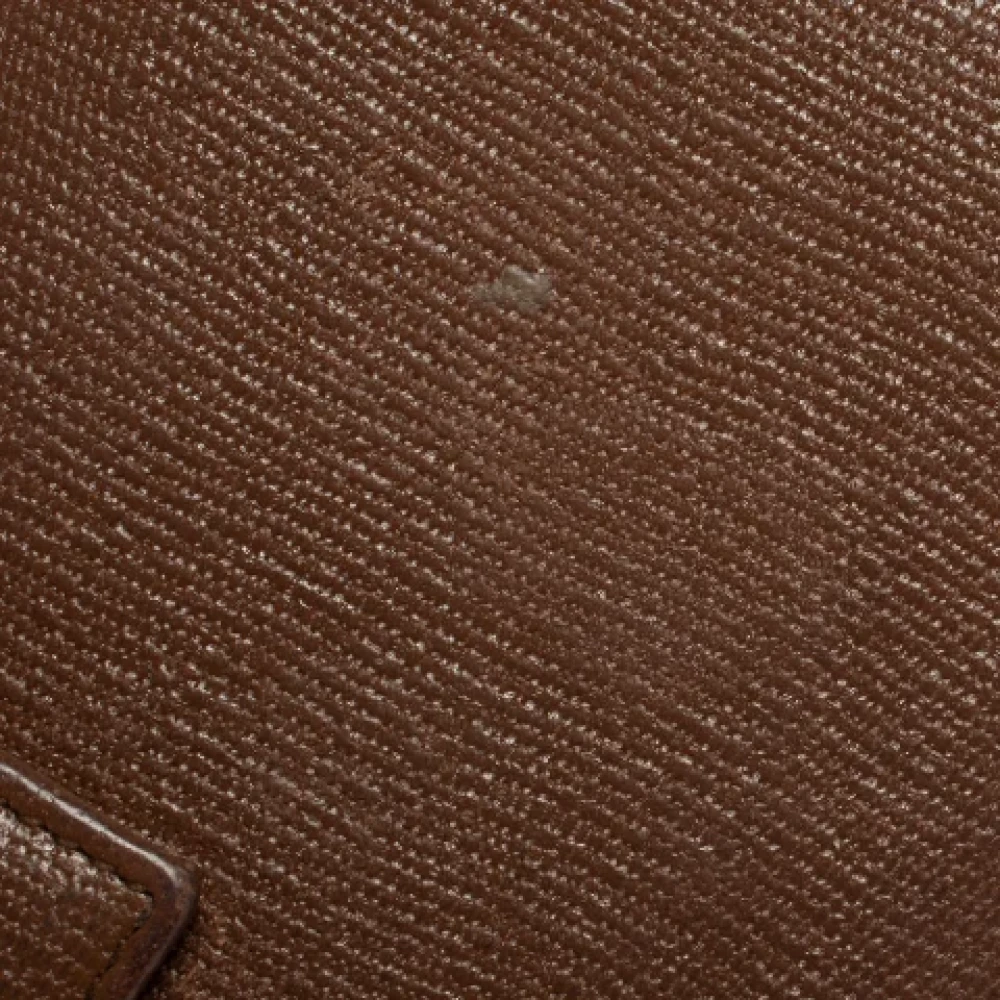 Yves Saint Laurent Vintage Pre-owned Leather wallets Brown Dames