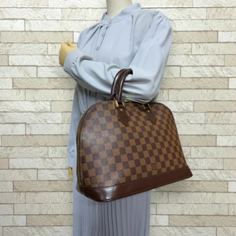 Louis Vuitton Vintage Pre-owned Canvas handbags Brown Dames