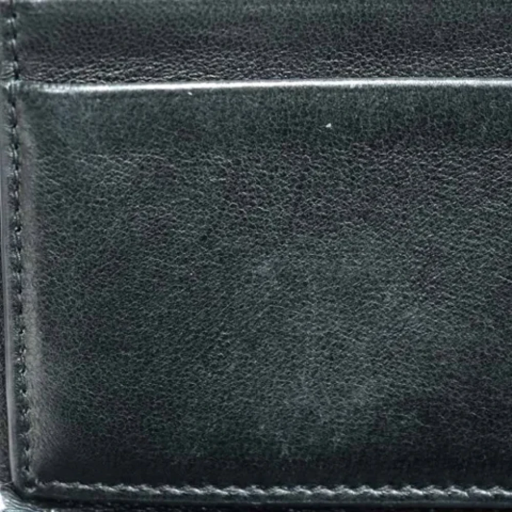 Yves Saint Laurent Vintage Pre-owned Leather wallets Black Dames