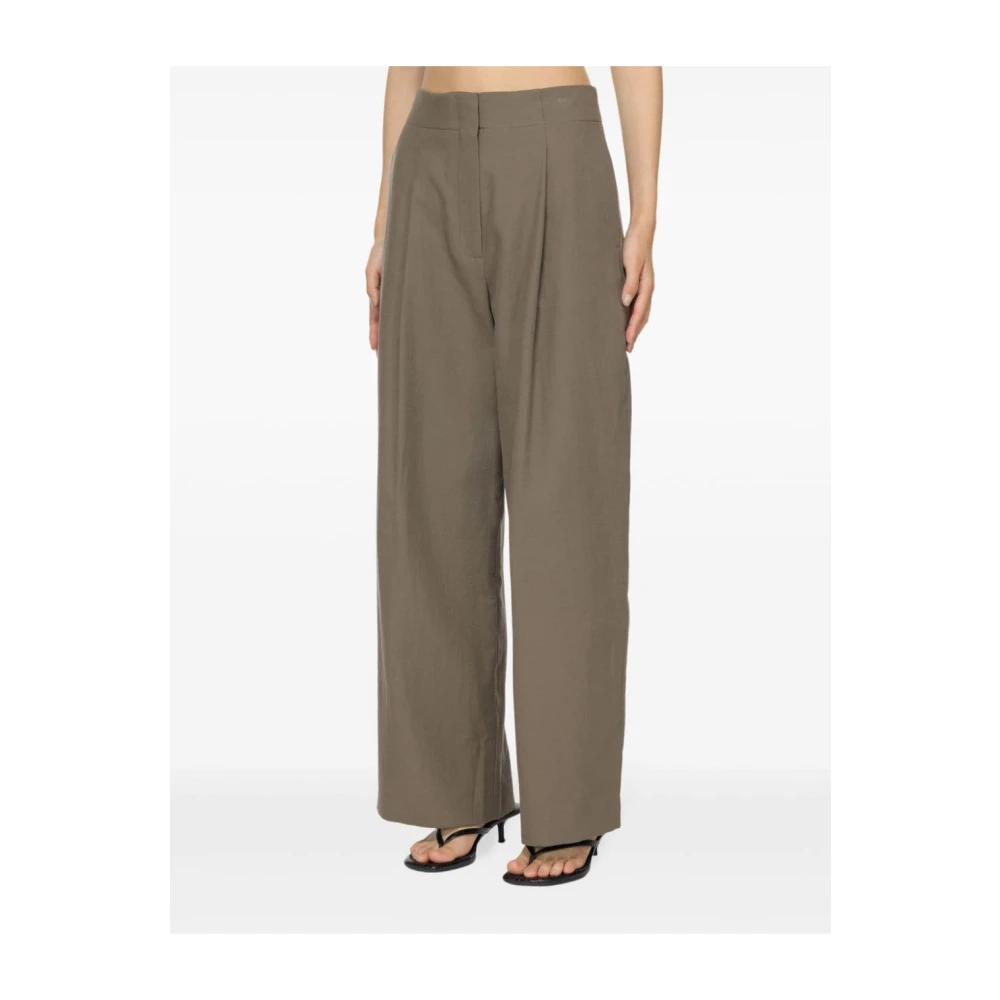 Studio Nicholson Bruine Katoenmix Broek met Plooien Brown Dames
