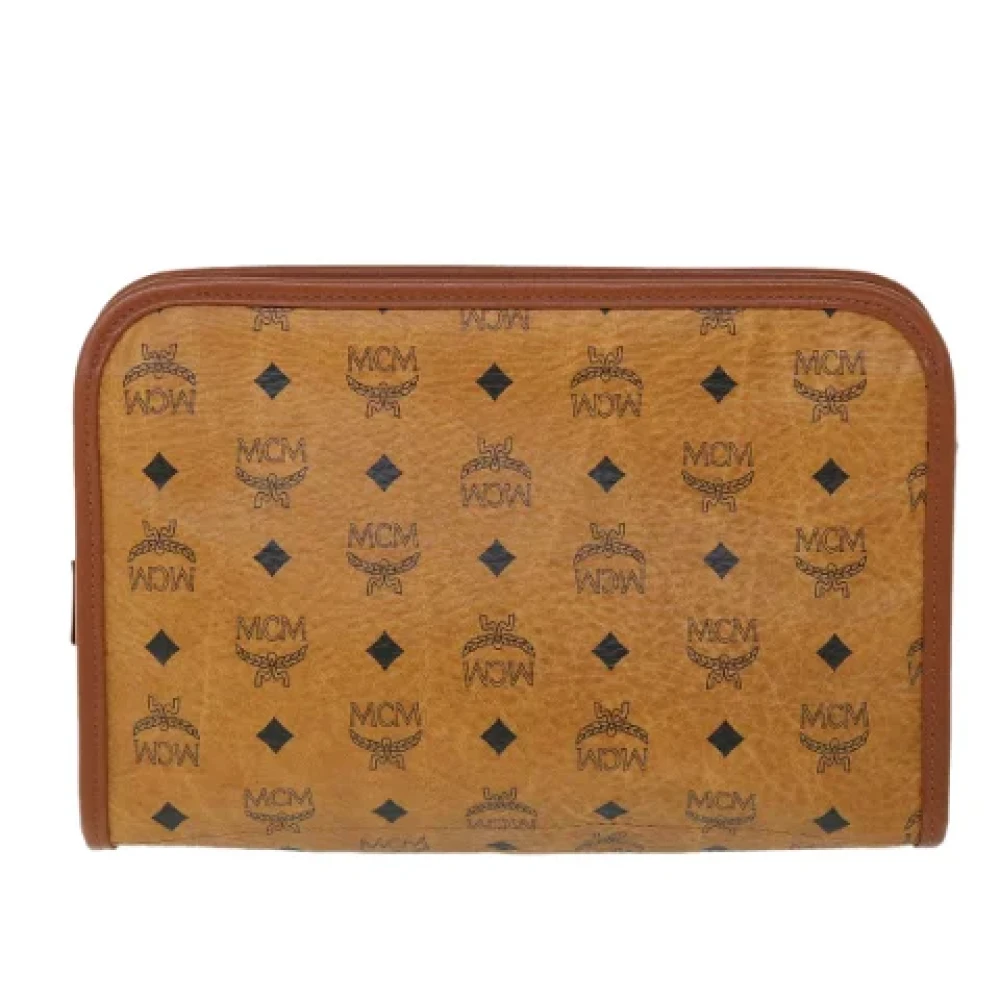 MCM Pre-owned Leather clutches Brown Dames