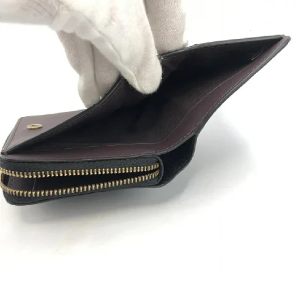 Coach Pre-owned Leather wallets Black Dames