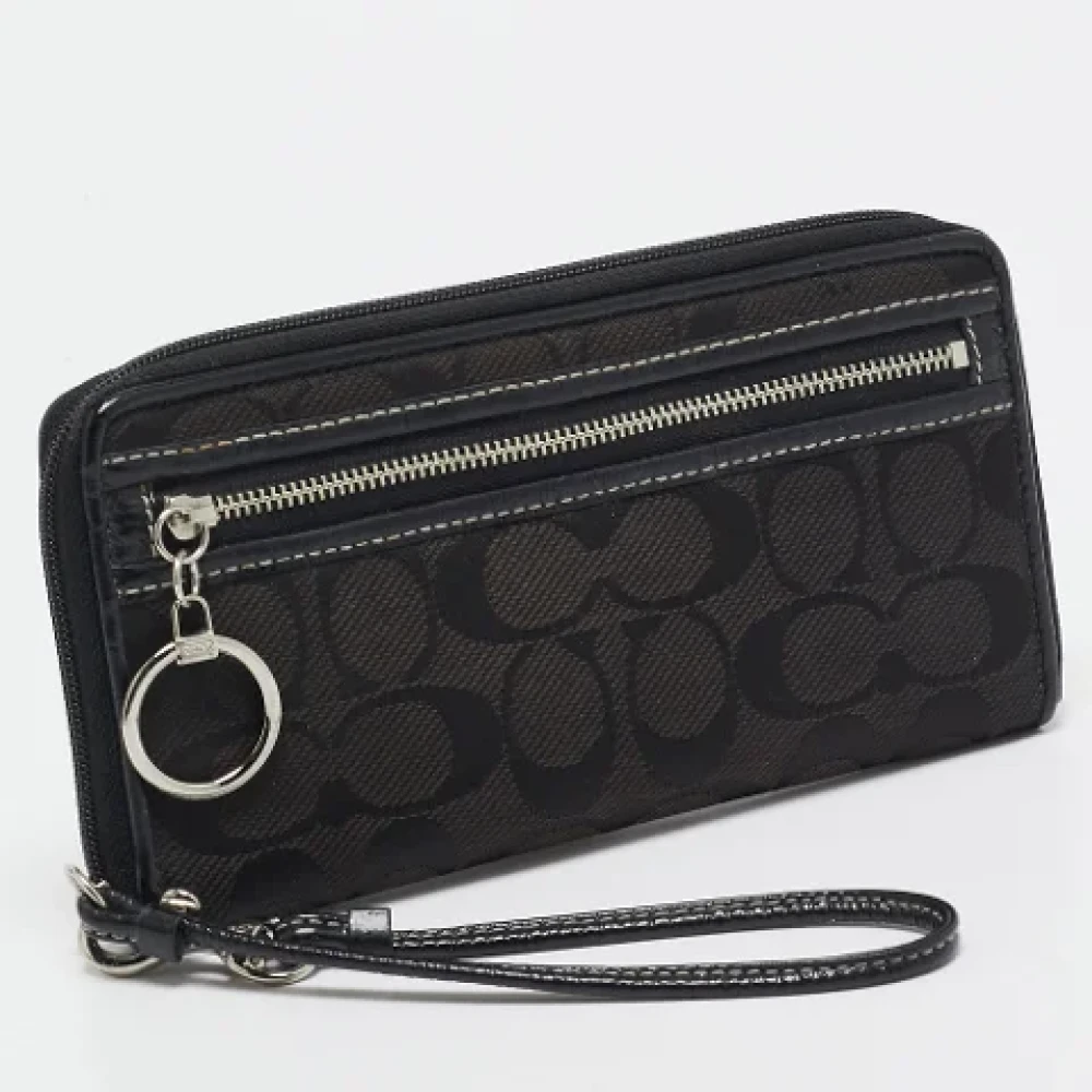 Coach Pre-owned Canvas clutches Black Dames