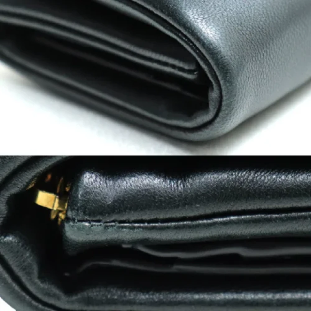 Yves Saint Laurent Vintage Pre-owned Leather wallets Black Dames