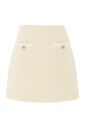 jupe-boucle-jaune-avec-boutons-dores