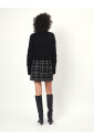 jupe-bouclee-tweed-noir-et-blanc