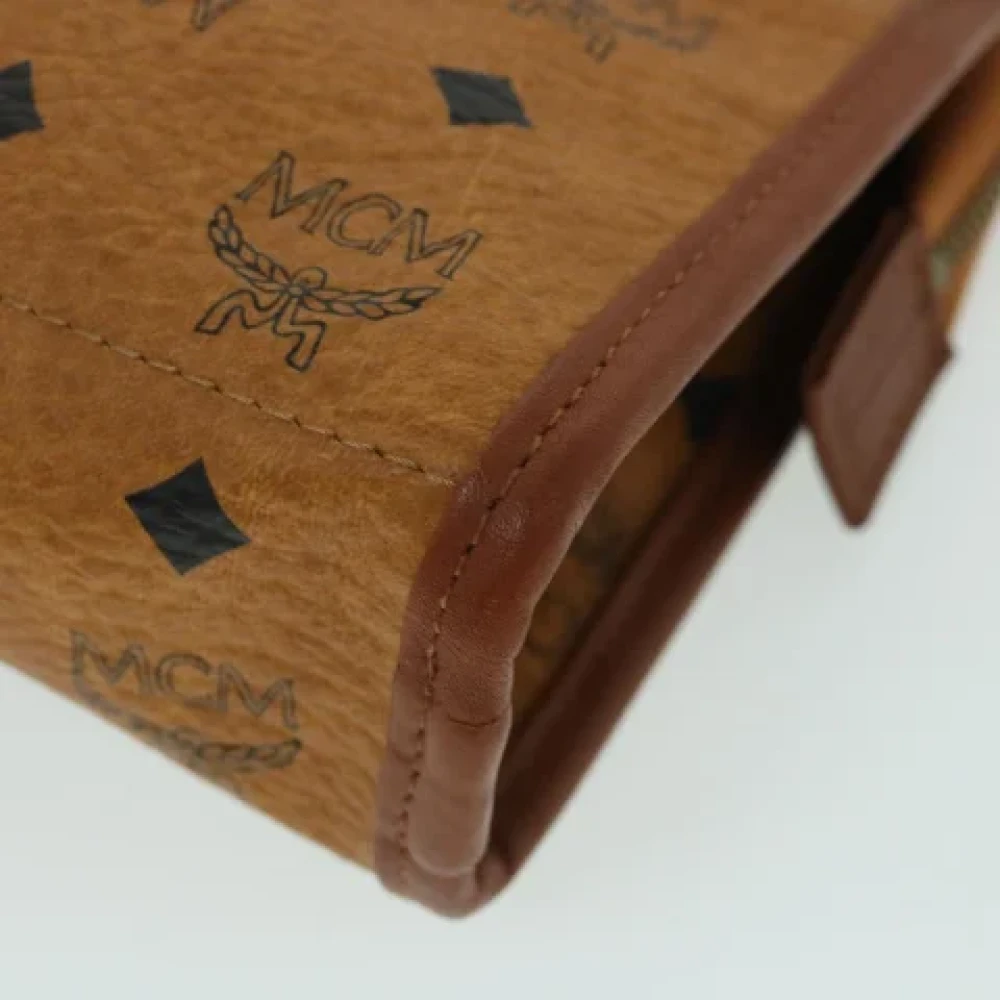 MCM Pre-owned Leather clutches Brown Dames