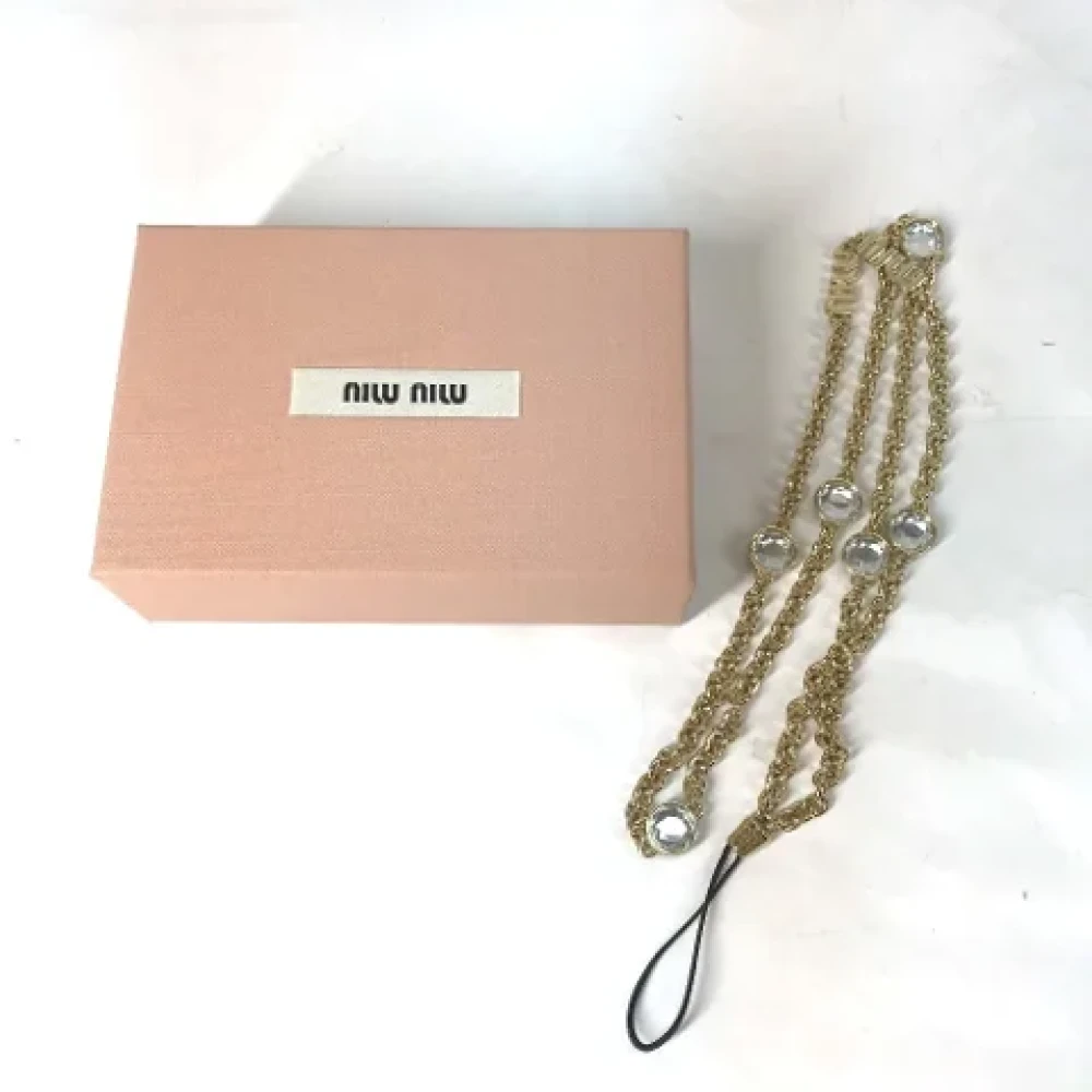Miu Pre-owned Metal key-holders Yellow Dames