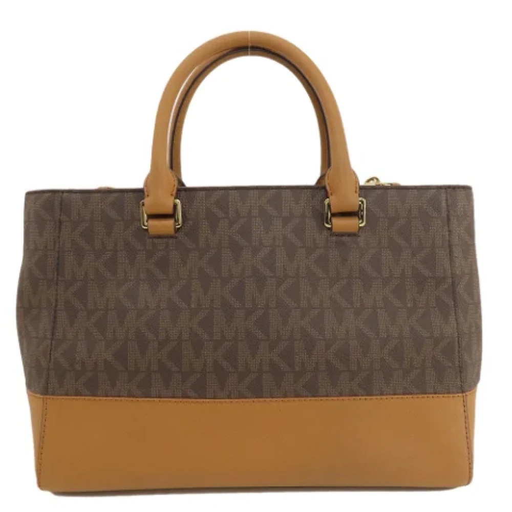 Michael Kors Pre-owned Plastic totes Brown Dames