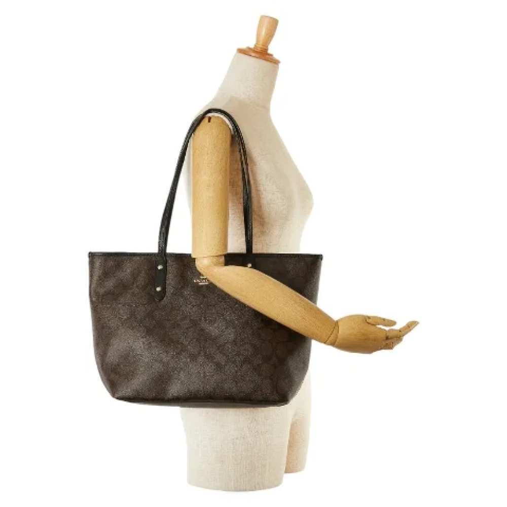 Coach Pre-owned Canvas handbags Brown Dames