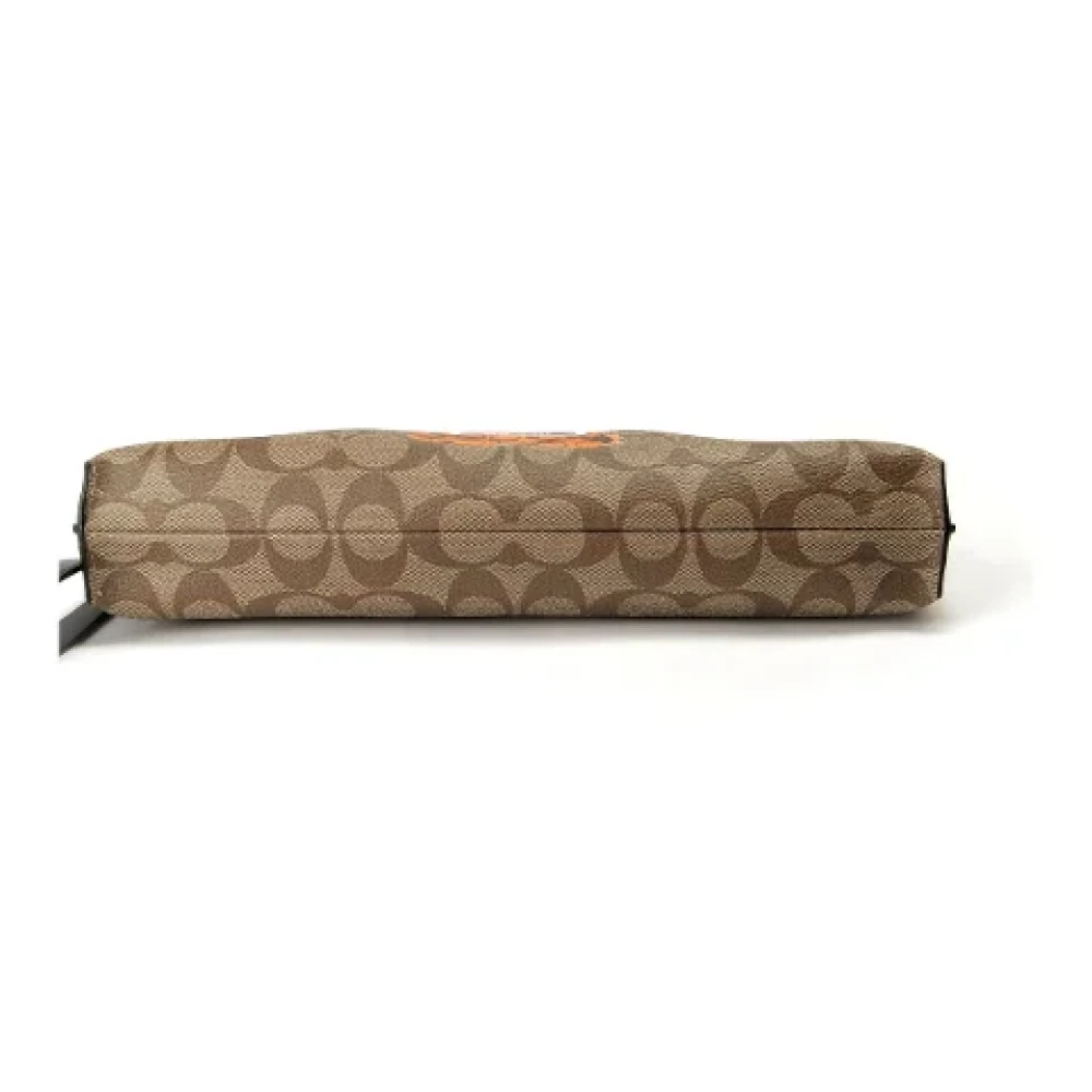 Coach Pre-owned Canvas clutches Brown Dames