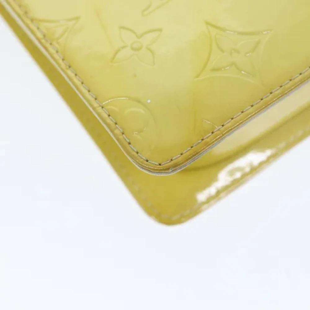 Louis Vuitton Vintage Pre-owned Leather clutches Yellow Dames