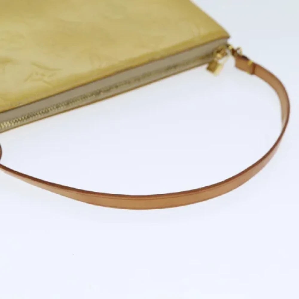Louis Vuitton Vintage Pre-owned Leather pouches Beige Dames
