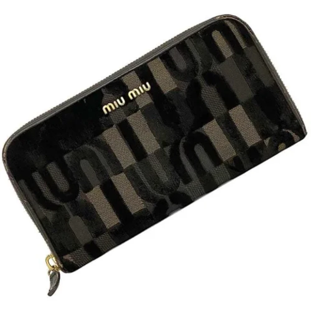 Miu Pre-owned Leather wallets Brown Dames