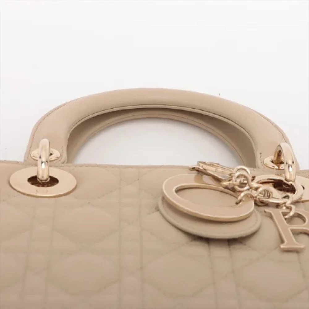 Dior Vintage Pre-owned Leather handbags Beige Dames