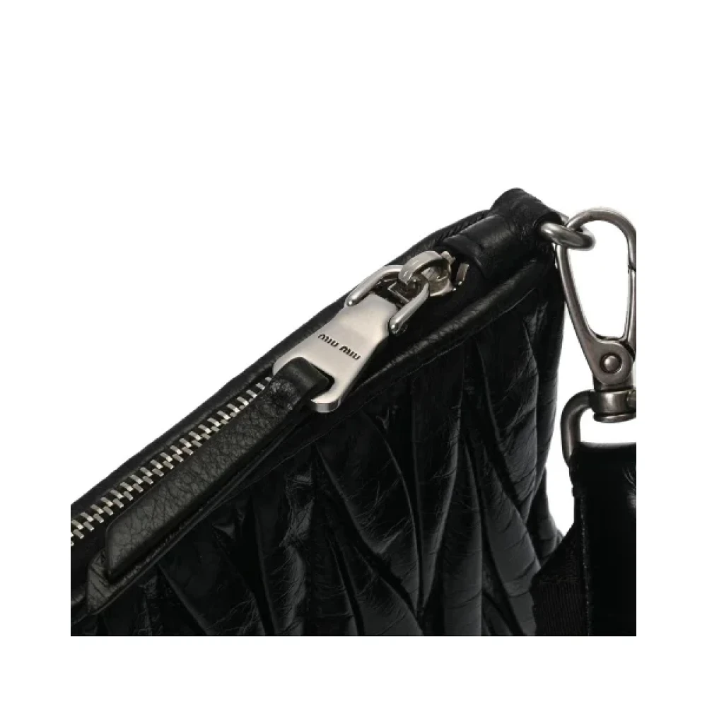 Miu Pre-owned Leather clutches Black Dames