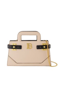petit-sac-bandouliere-en-cuir-avec-poignee