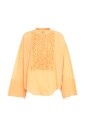 orange-ruffled-blouse-with-trumpet-sleeves