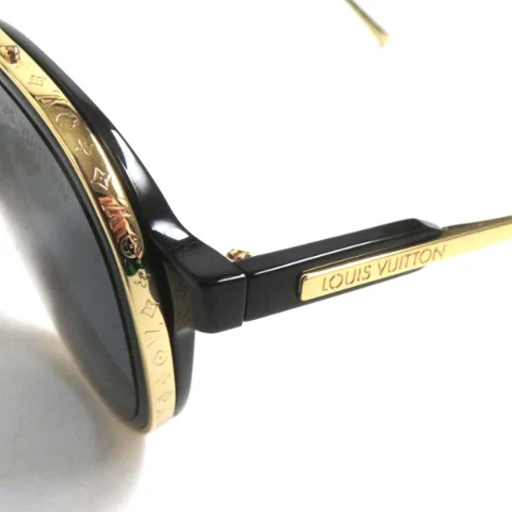 Louis Vuitton Vintage Pre-owned Metal sunglasses Yellow Dames