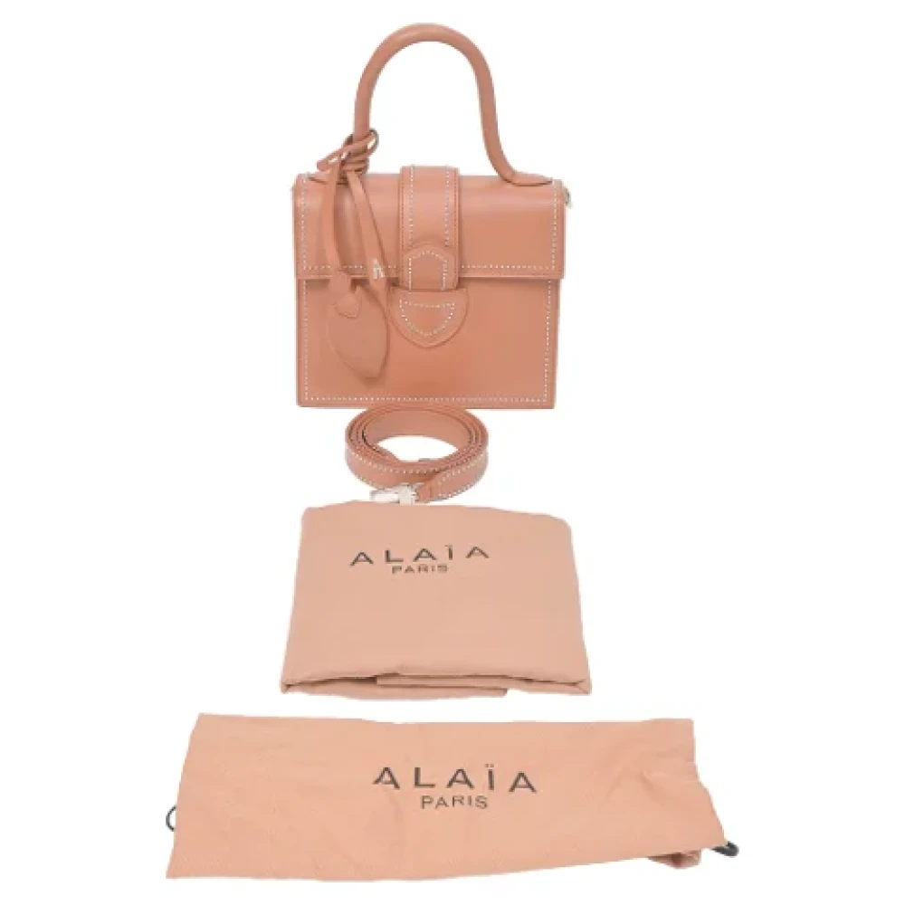Alaïa Pre-owned Leather handbags Brown Dames