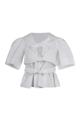 V-ringad blus med rosetter